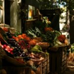 a bunch of fruits and vegetables are on display