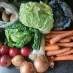 a bunch of vegetables that are on a table