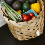 bunch of assorted produce in brown wicker basket