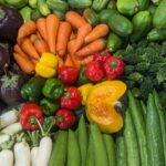 a variety of vegetables are arranged on a table